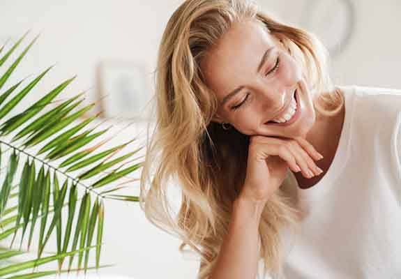 Woman smiling after treatment